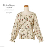デザインボタンブラウス