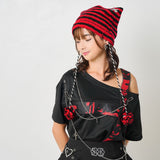 十字架パーツチェーン付オフショルカットソーチュニックトップス