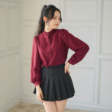 フリルスタンドカラーブラウス