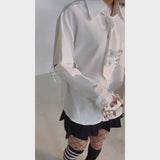 ハトメサブジラ系ビッグシャツ