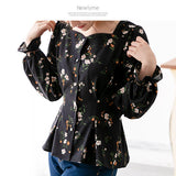 デザインボタンブラウス