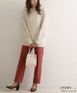 バックシャンケーブルニットトップス