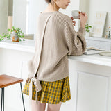 バックシャンスリットリボンケーブルニットトップス