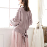 バックシャンスリットリボンケーブルニットトップス