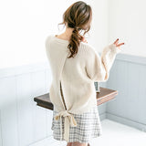 バックシャンスリットリボンケーブルニットトップス