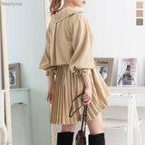 バックプリーツショートトレンチコート