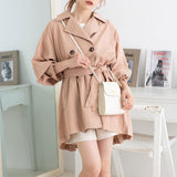 バックプリーツショートトレンチコート