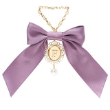 イニシャルチャームリボンクリップ