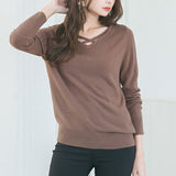 カシミヤタッチクロスデザインニット