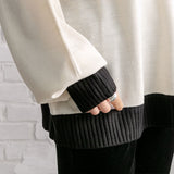 ハイネックバックロゴニットトップス