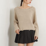 ダメージニットトップス