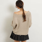 ダメージニットトップス