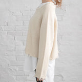 ダメージニットトップス