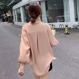 チュールレイヤードスリーブブラウス