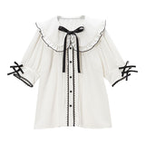 大きめ丸襟リボンフリルブラウス