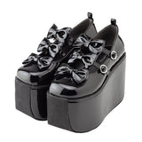 ぽってり厚底トリプルリボンパンプス