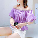 ボリュームスリーブペプラムブラウス