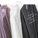 バックメッセージプリントシアーシャツ