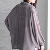 バックメッセージプリントシアーシャツ