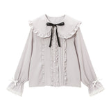 大きめ丸襟フリルブラウス