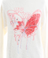 ふわふわダメージ加工バタフライビジューニットトップス