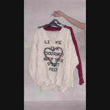 サブカル地雷系ダメージ風ゆるだぼ英字ロゴ長袖ニットトップス